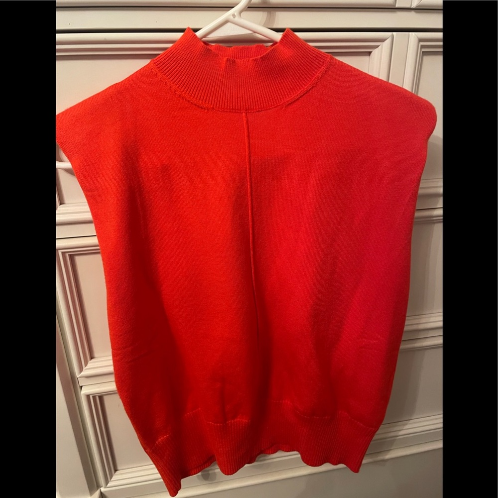 Orange sleeveless sweater top